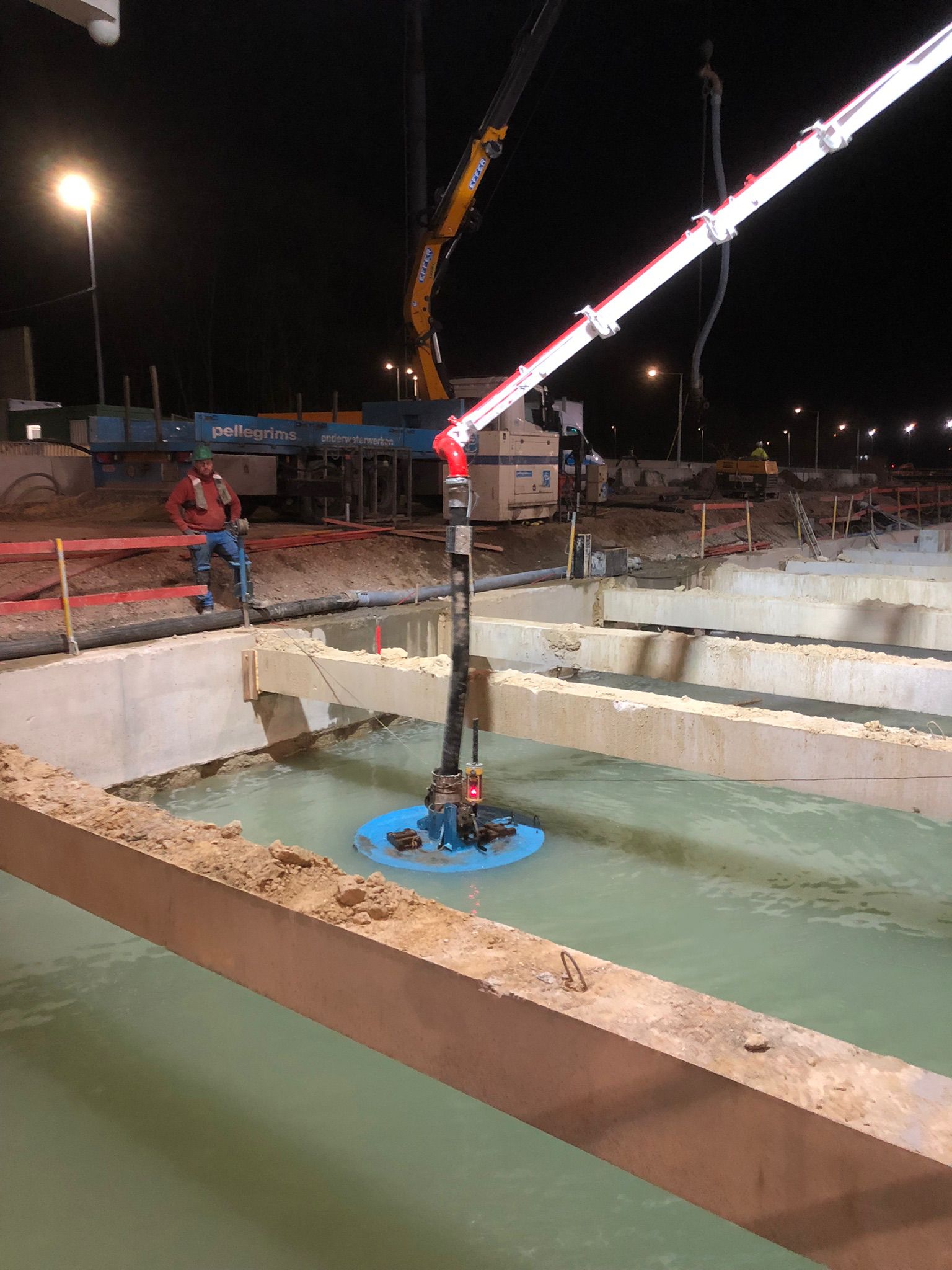 Underwater concrete pour using a float