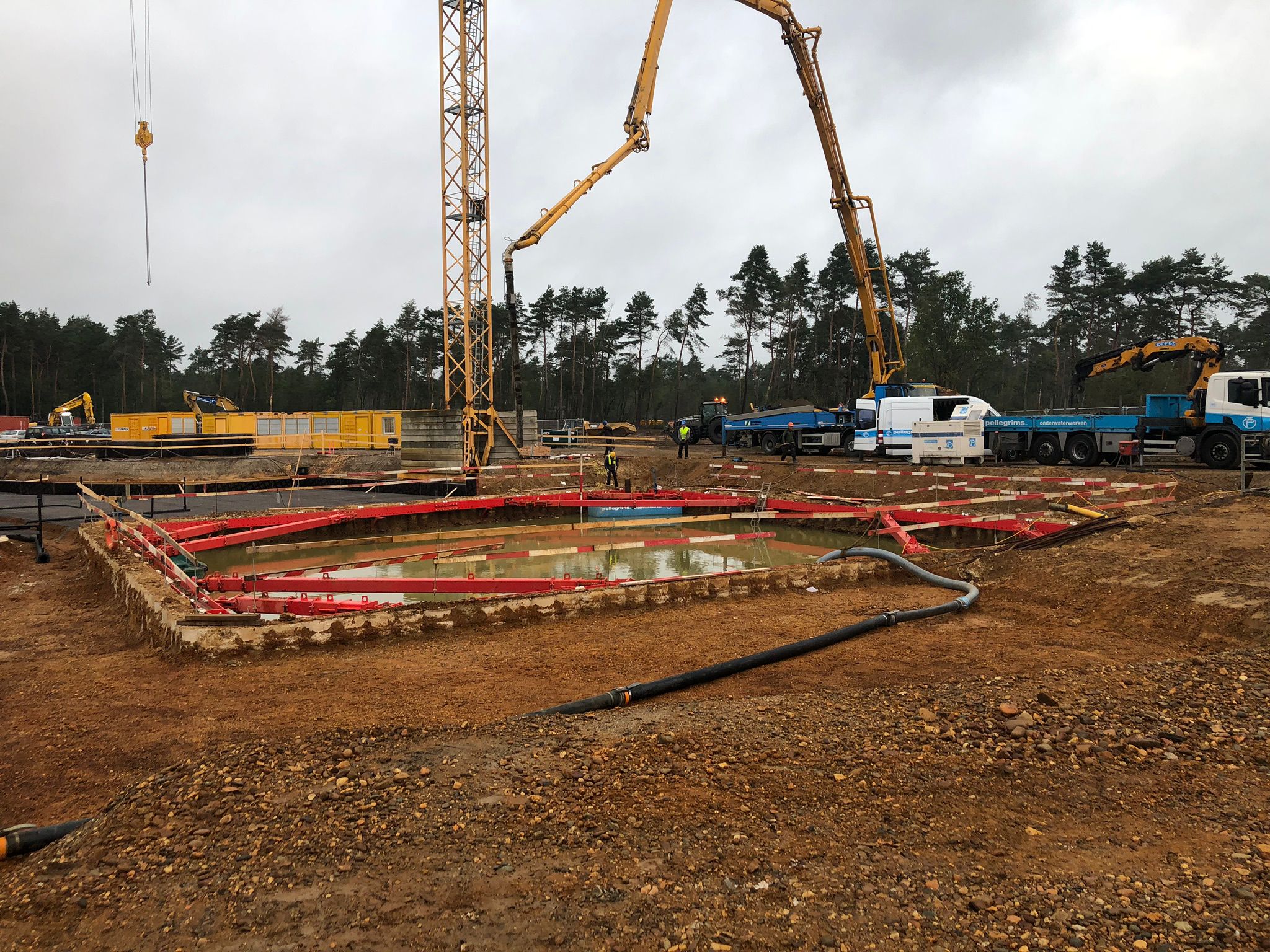 Excavation and underwater concrete pour in a cofferdam